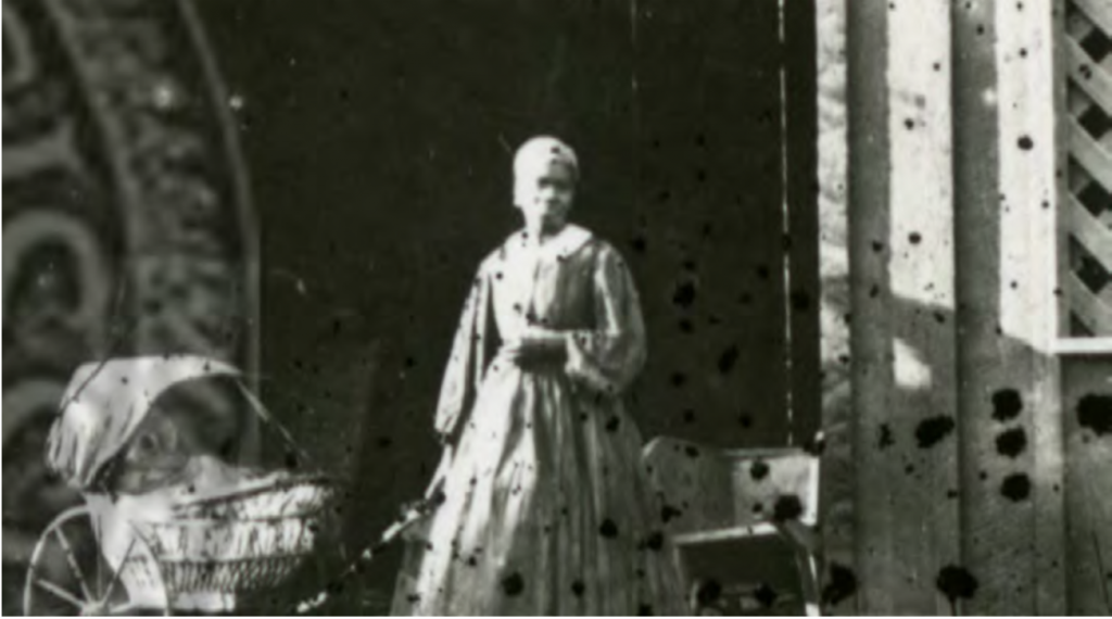 Zoomed in portion of the Boynton photo from title page, showing woman and baby carriage, University of Mississippi, (circa 1860): UM Special Collections